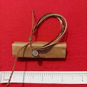 Pura Vida Brown Cord and Silver Tone Logo Tag Bracelet